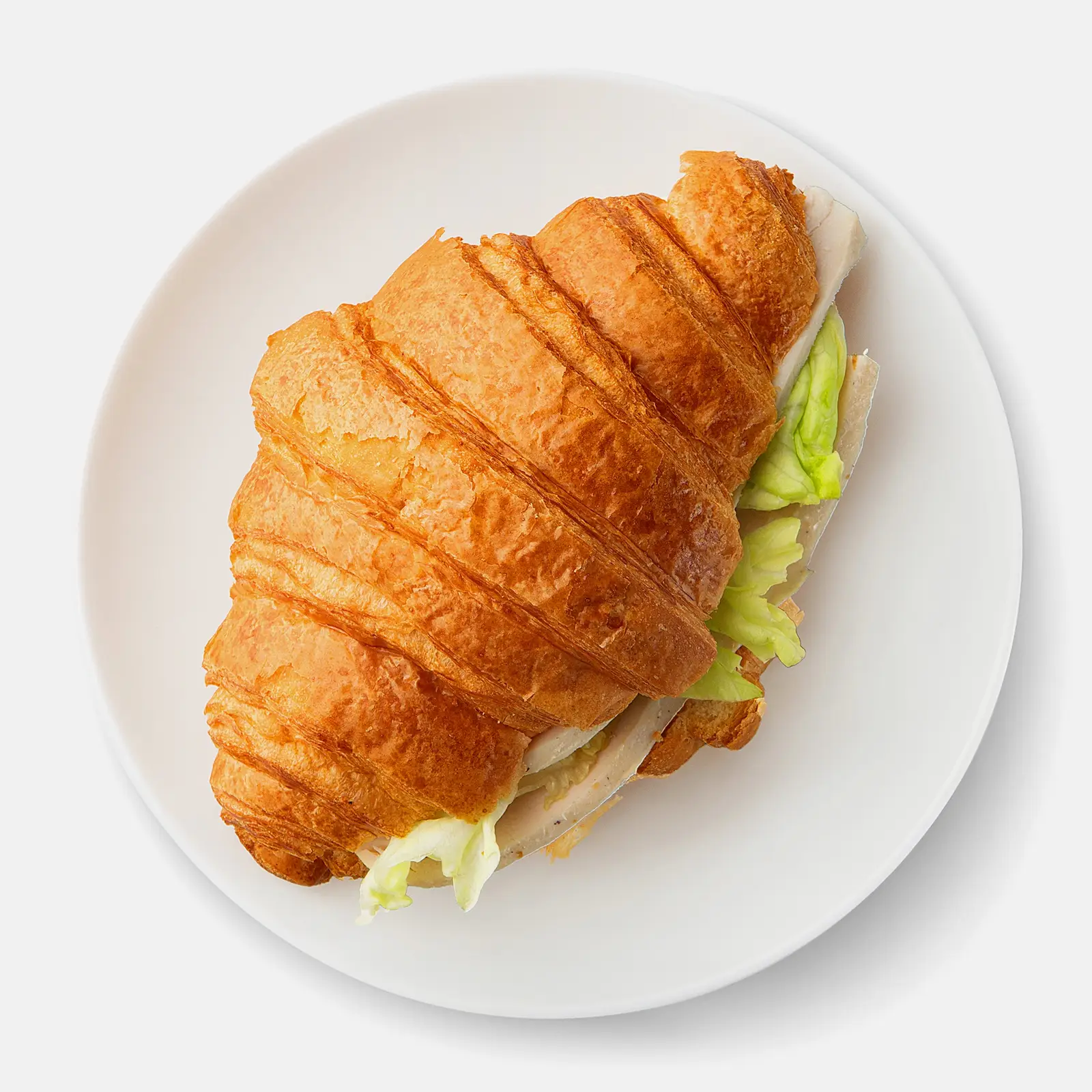 Изображение товара Круассан с курицей и салатом Цезарь 115г - вкусный и сытный продукт