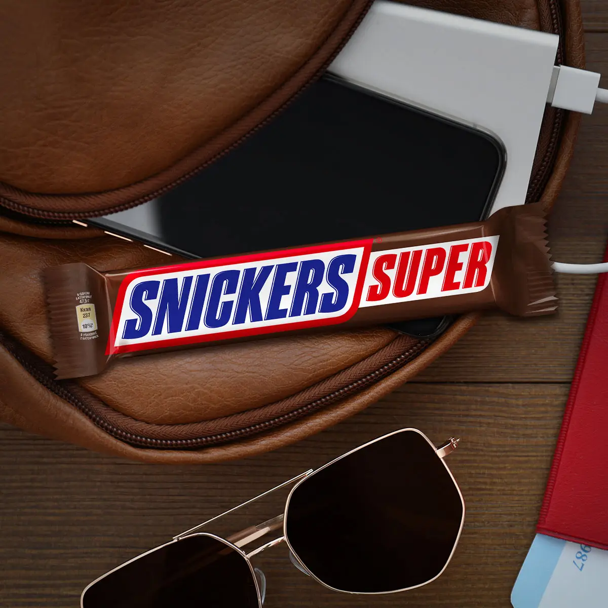 Батончик Snickers Super шоколадный с карамелью арахисом и нугой 80г