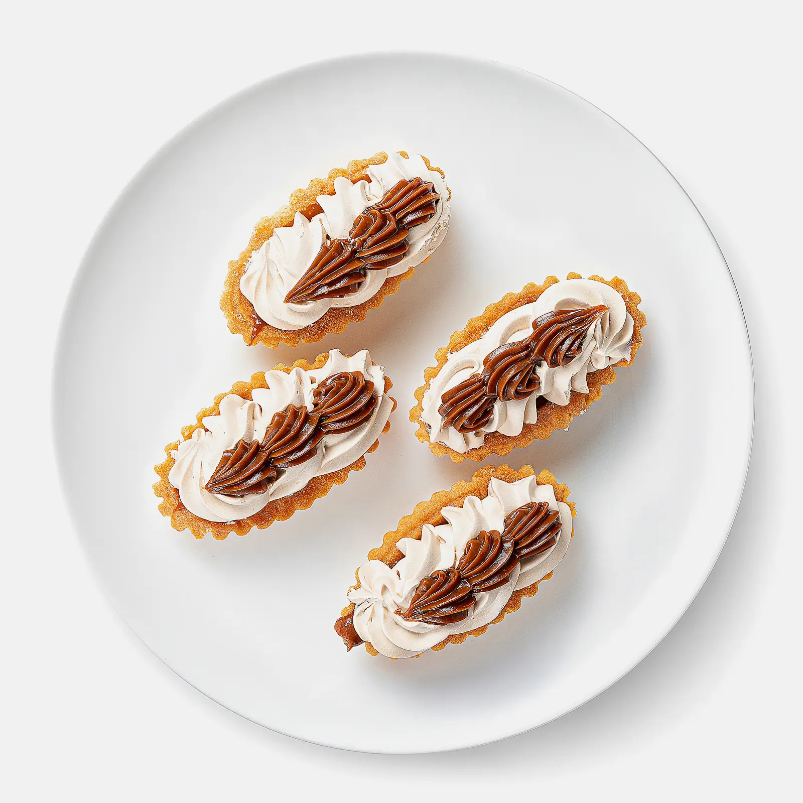 Изображение товара Пирожное Ириска Невские берега 4шт 320г - сладкое десертное изделие с натуральными ингредиентами