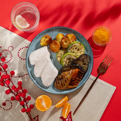 Изображение товара Индейка под соусом из апельсинового сока с овощами гриль 250г