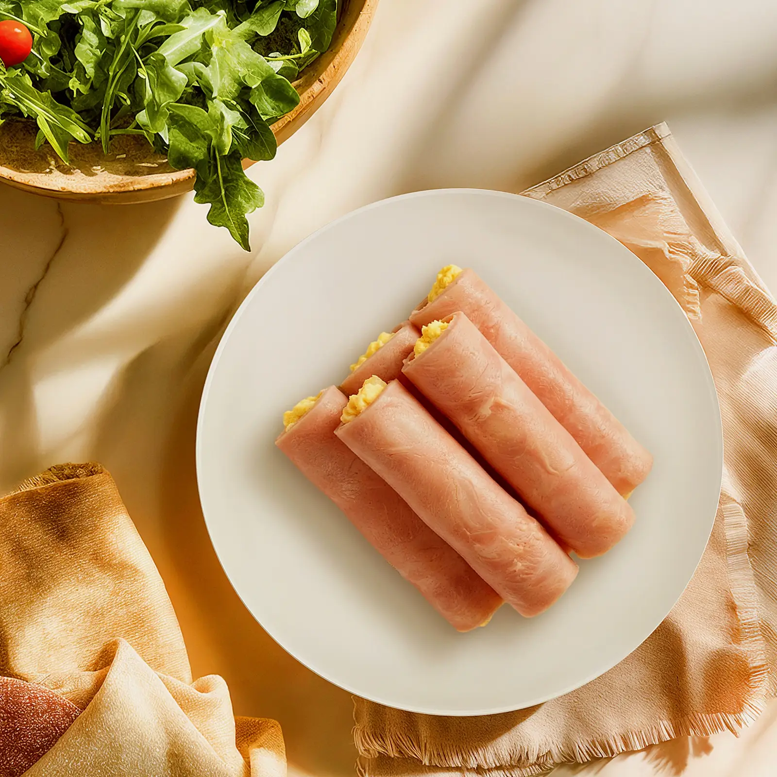 Рулеты из ветчины с сыром и чесноком