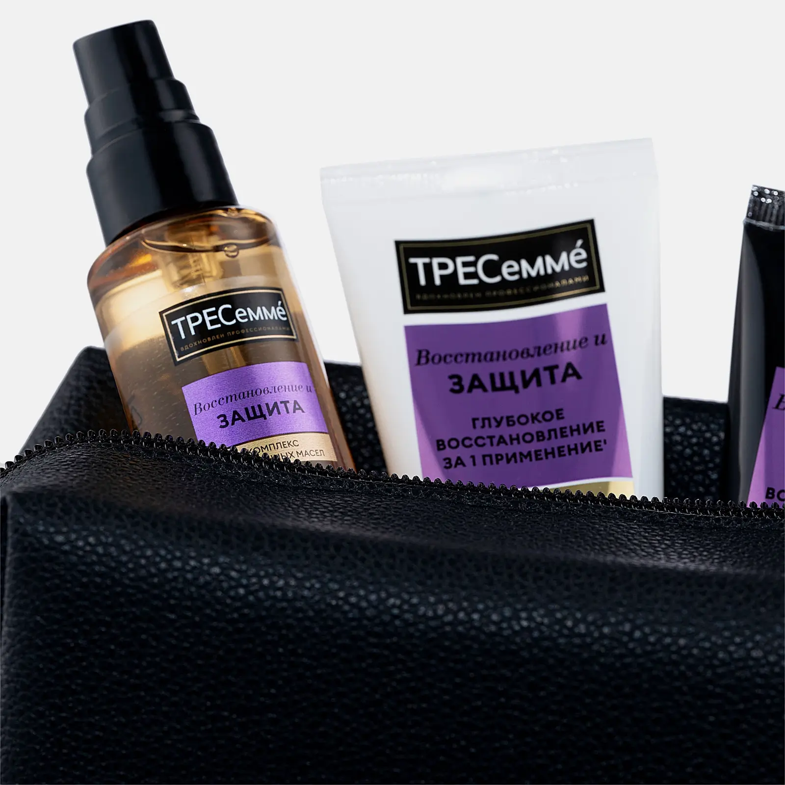 Подарочный тревел-набор для волос ТРЕСеммé Восстановление Шампунь 45мл + Кондиционер 45мл + Масло 50мл + Сухой шампунь 75мл в ассортименте