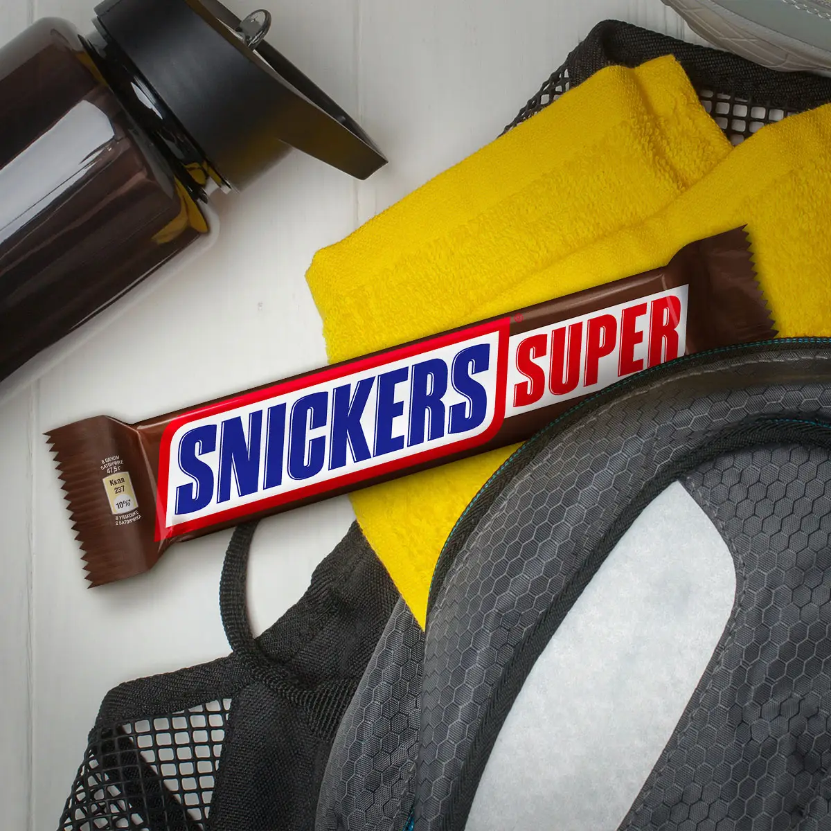 Батончик Snickers Super шоколадный с карамелью арахисом и нугой 80г