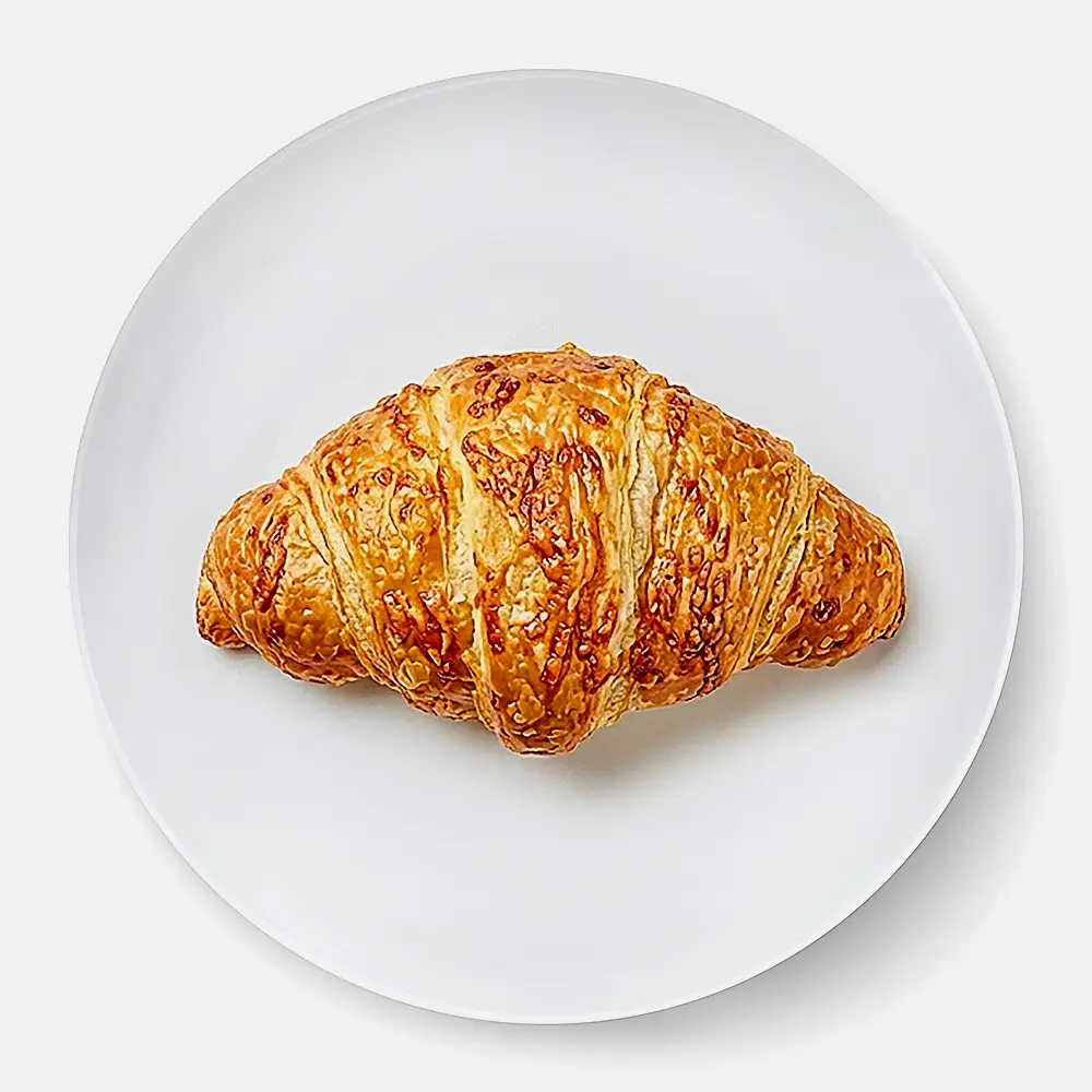 Изображение товара Круассан с сыром 100 г - свежая выпечка для завтрака и перекуса