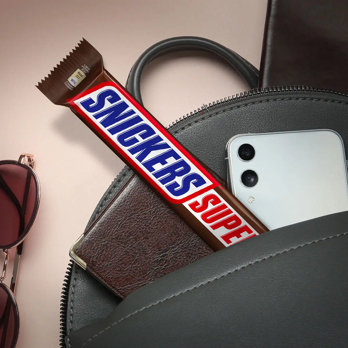 Батончик Snickers Super шоколадный с карамелью арахисом и нугой 80г